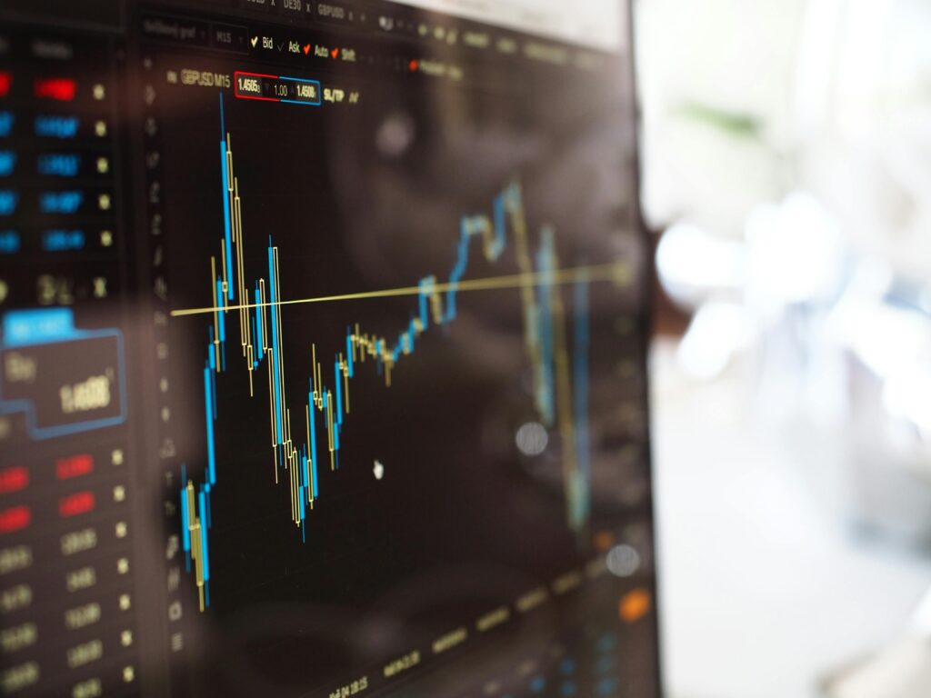 Data and Backup Recovery 1 Detailed view of financial trading graphs on a monitor, illustrating stock market trends.
